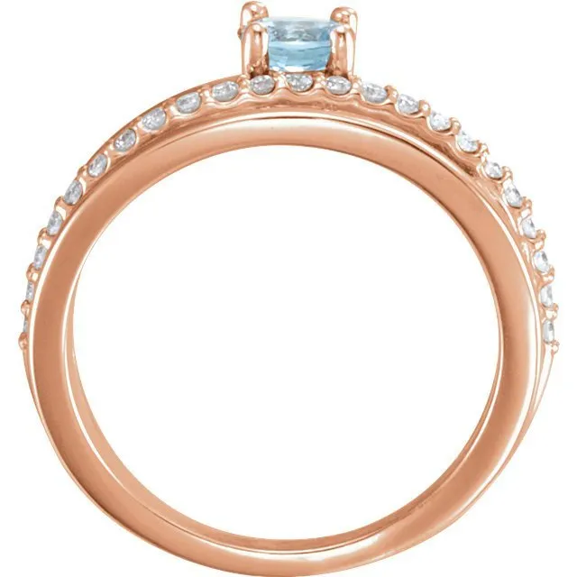 14KT GOLD 0.30 CT AQUAMARINE & 1/4 CTW DIAMOND BYPASS RING