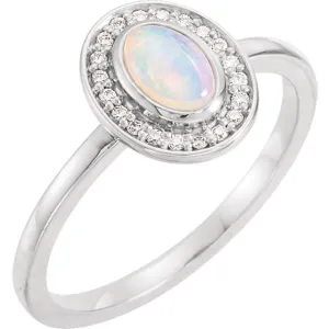 14KT GOLD 0.95 CT MOONSTONE & 1/10 CTW DIAMOND OVAL HALO RING