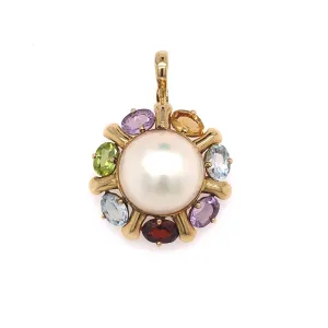 Mabe Pearl and multi gemstone pendant 14kt yellow gold