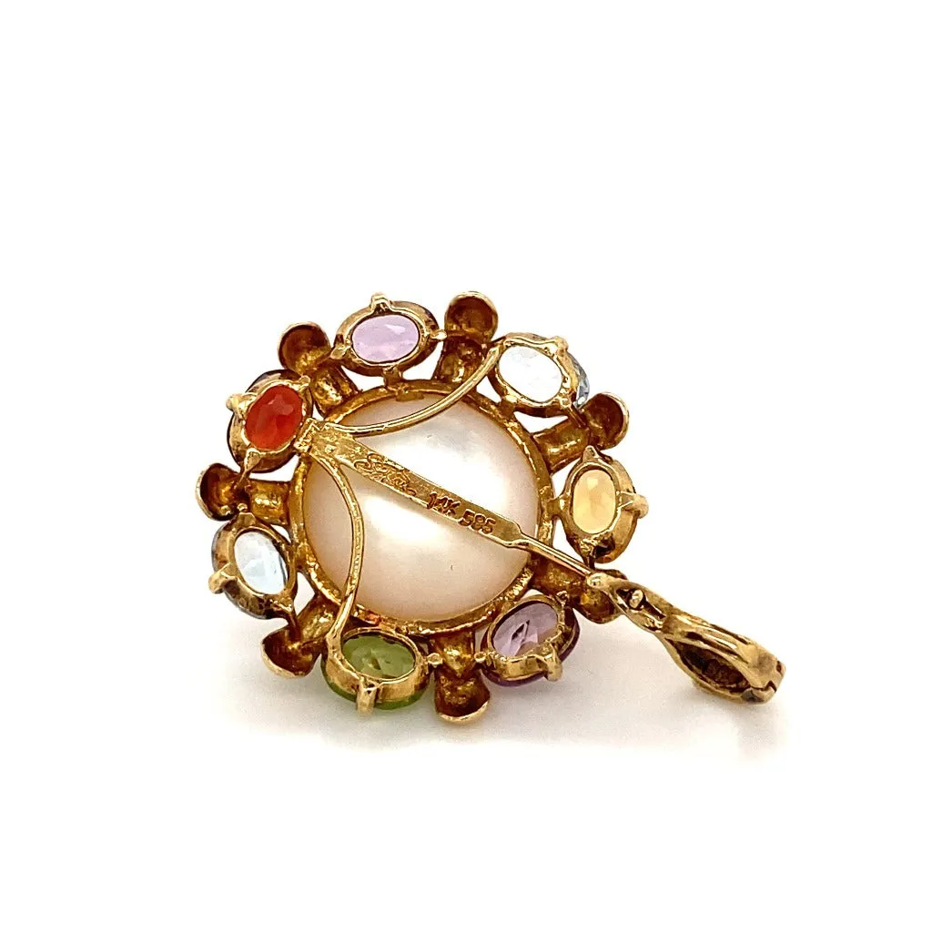 Mabe Pearl and multi gemstone pendant 14kt yellow gold