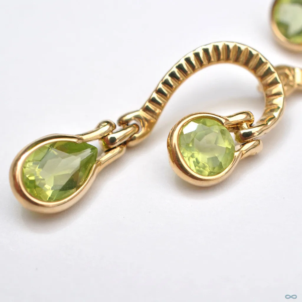 Waterfall Dangle Navel Curve in Yellow Gold with Peridot from BVLA