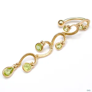 Waterfall Dangle Navel Curve in Yellow Gold with Peridot from BVLA